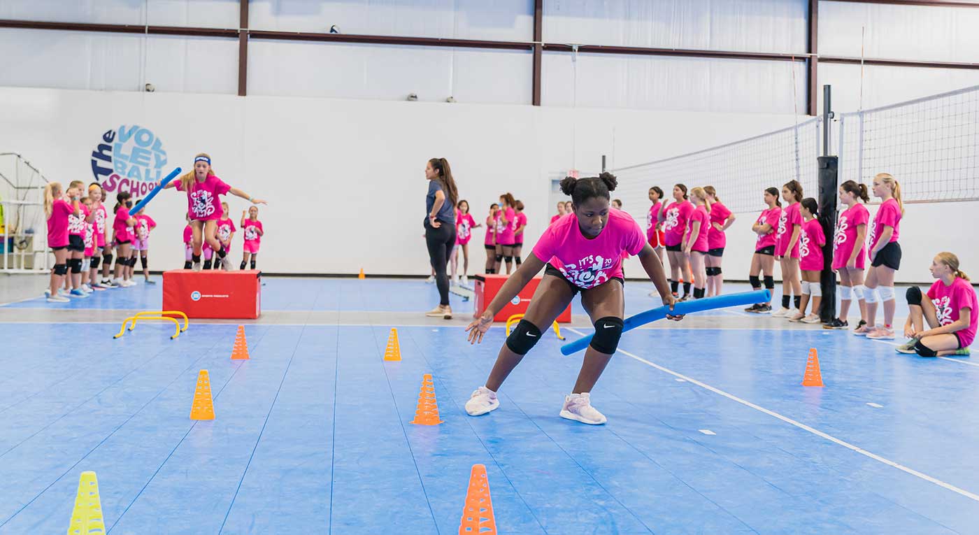 Group of girls in the volleyball school camp